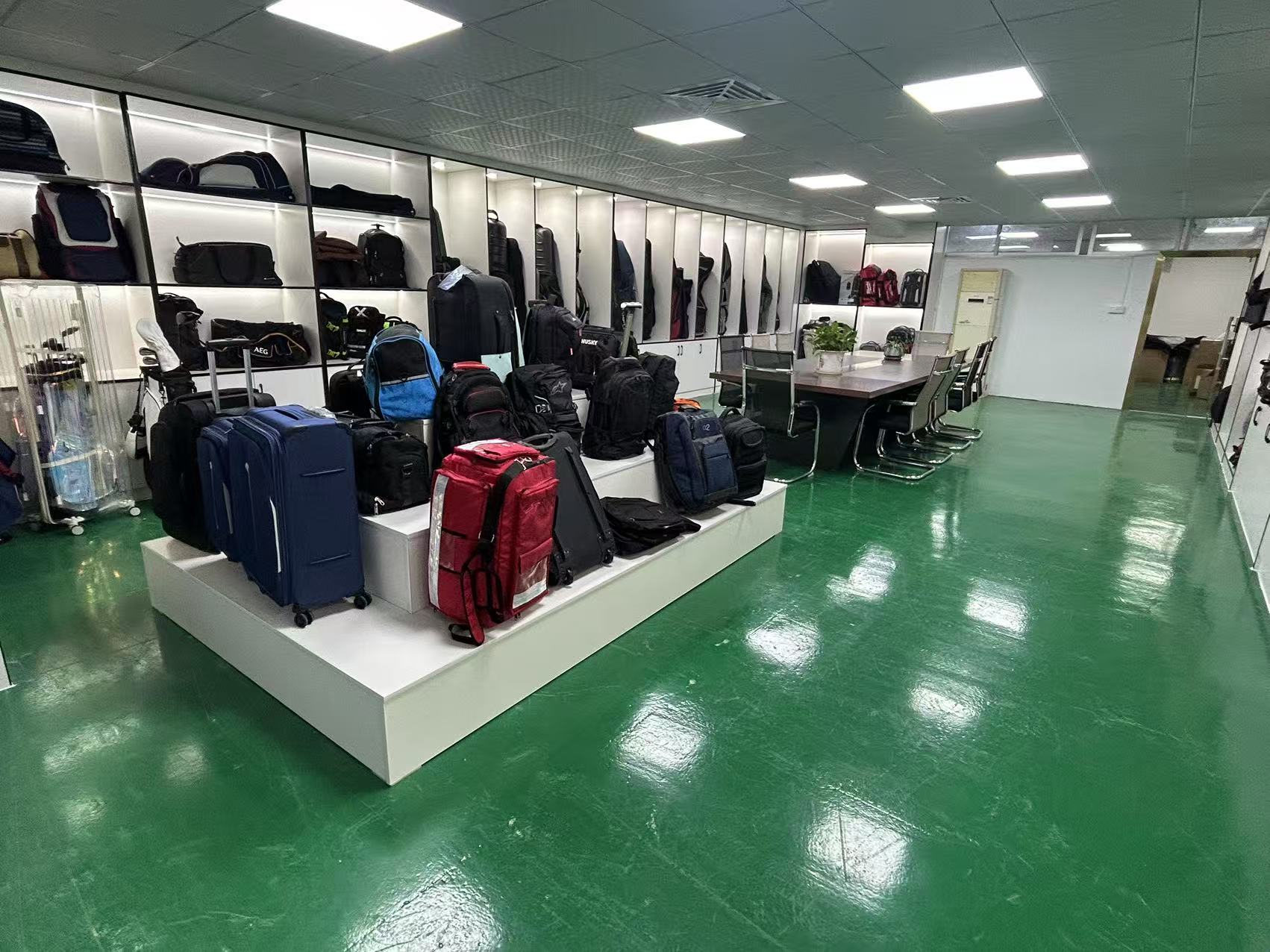 Custom bag samples on display at Sanyingbags showroom OEM/ODM handbag designs showcased in Sanyingbags showroom